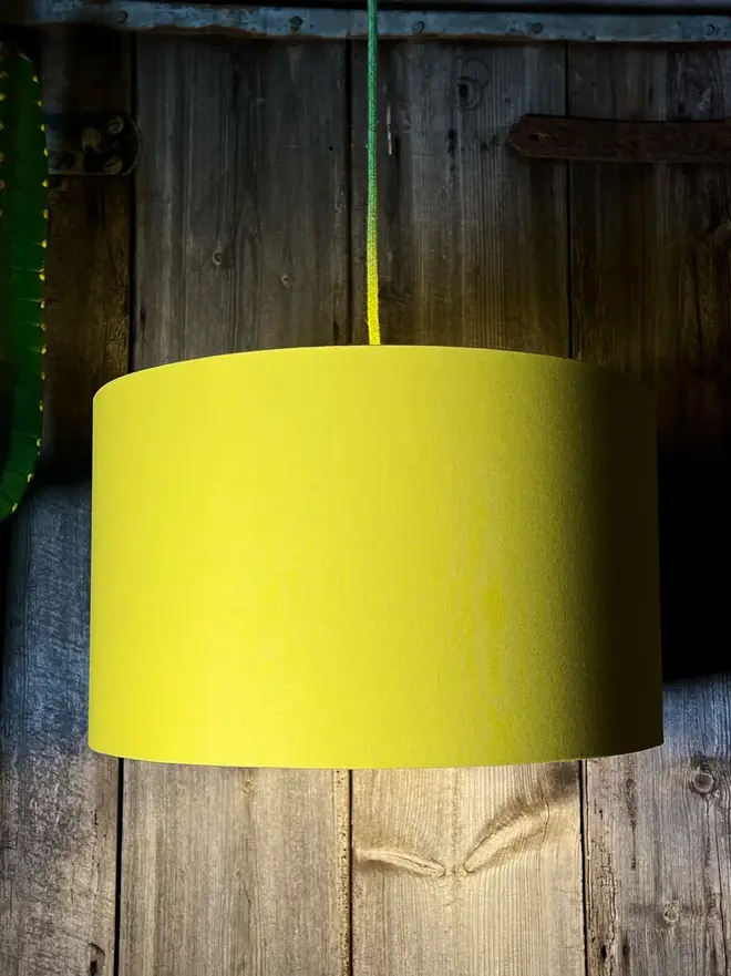 Cotton Lampshade With Gold Foil Lining, hanging. 