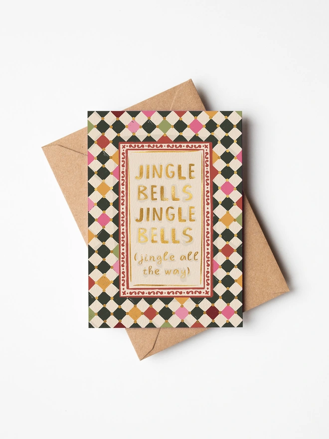 Jingle bells Jingle bells (jingle all the way) checkerboard greeting card on white background