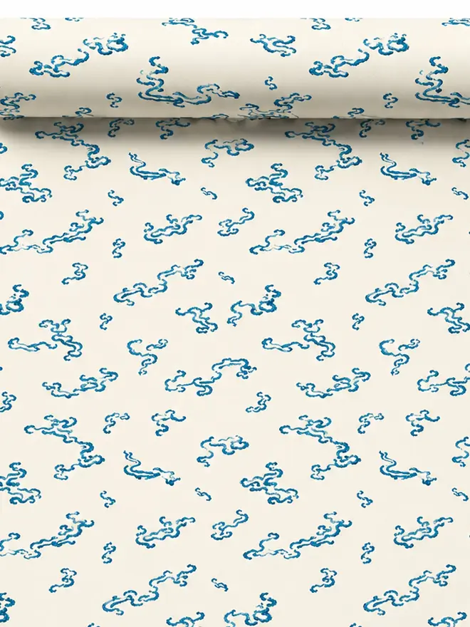 indigo waves illustrated wallpaper. a cream background wallpaper with blue waves.