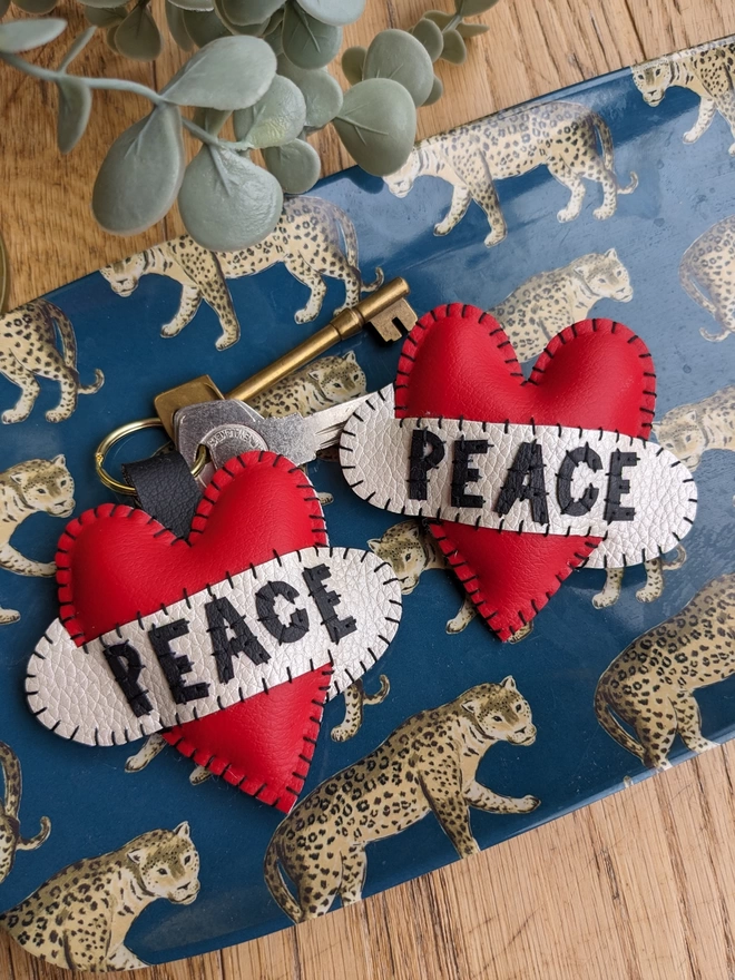 Peace red leatherette heart keyring and brooch