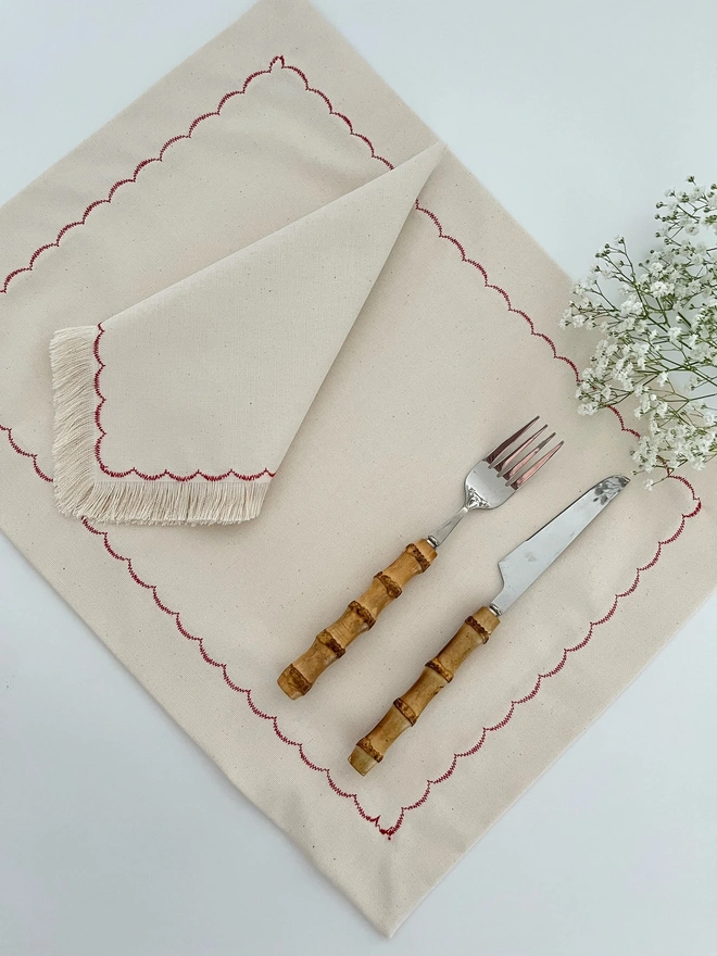 red scalloped placemat