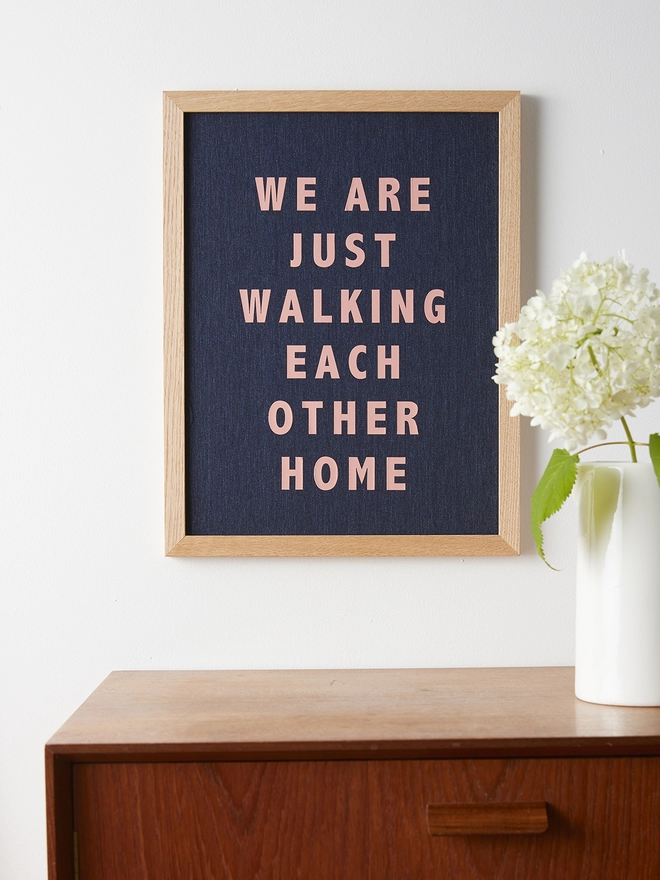 We are just walking each other home navy linen picture with salmon pink lettering