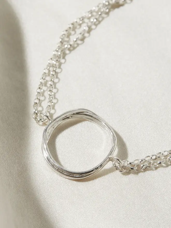 Close up image of the Silver Organic Circle Bracelet 
