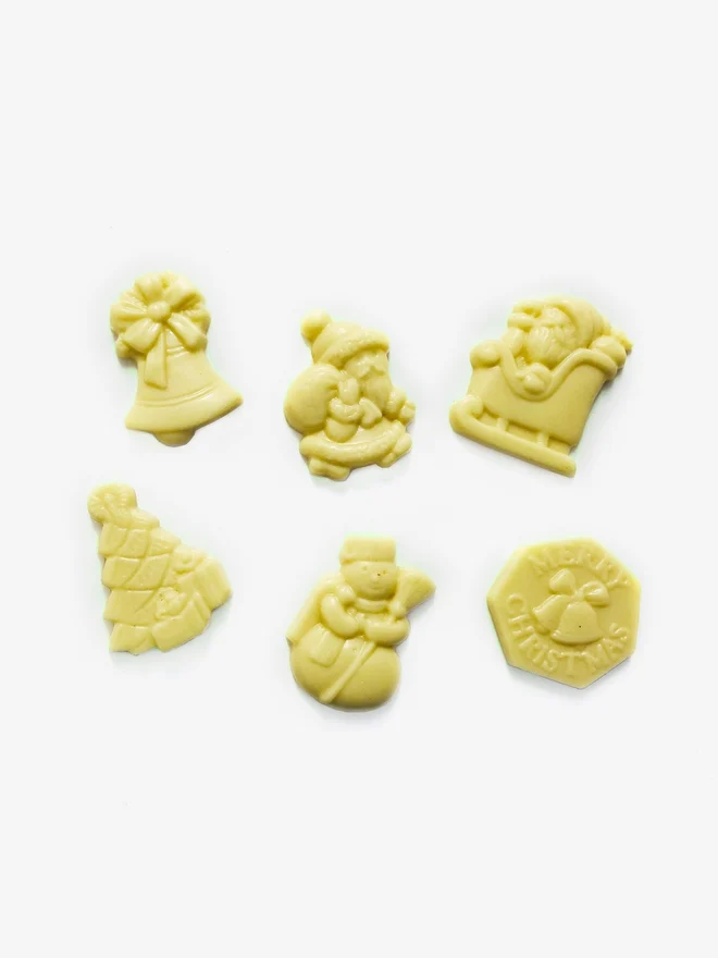 A selection of solid white chocolate Christmas shapes by Harry Specters