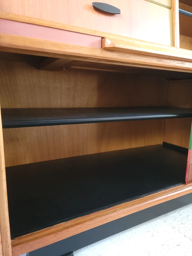 Inside teak sideabord with black painted shelves