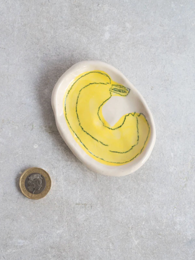 Wee Dishes. A dish with a banana design.