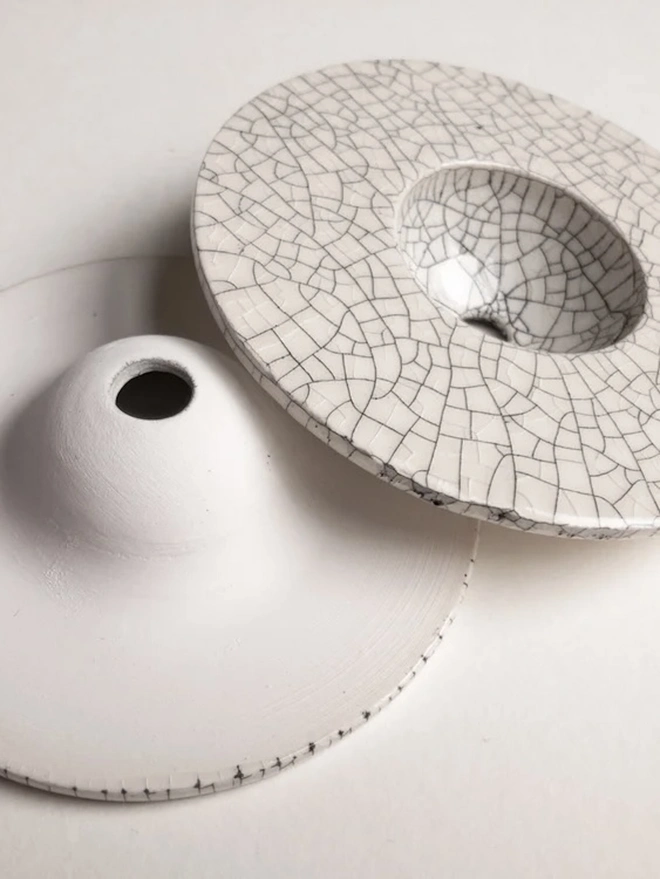 DIY Growing Kit CRACKLE, the growing discs sitting on a plain surface. 