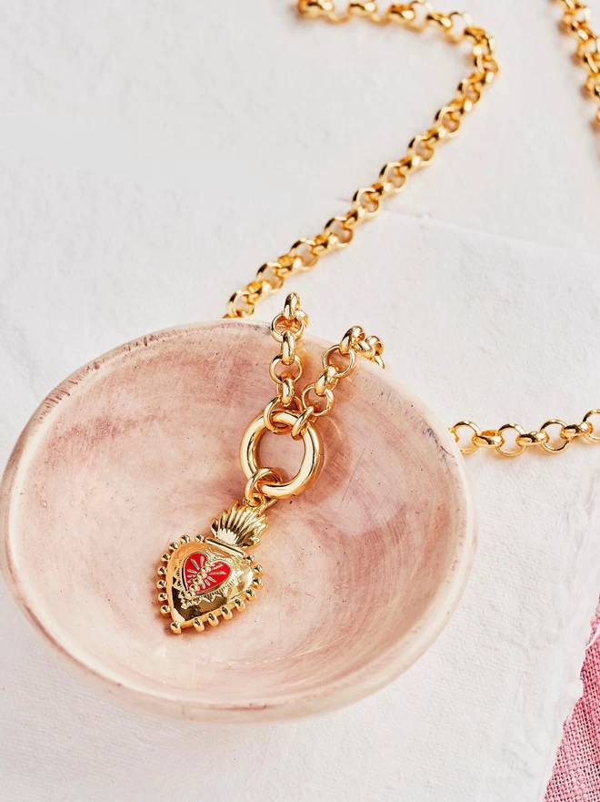 Red and gold frida kahlo heart charm on gold belcher chain