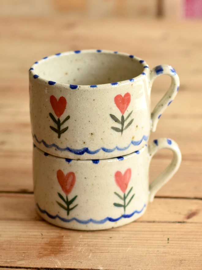 two Celia heart mugs
