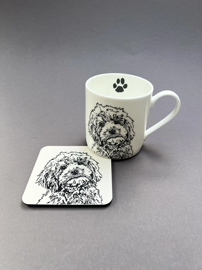 Melamine coaster illustrated with the face of a fluffy cockapoo puppy with matching mug