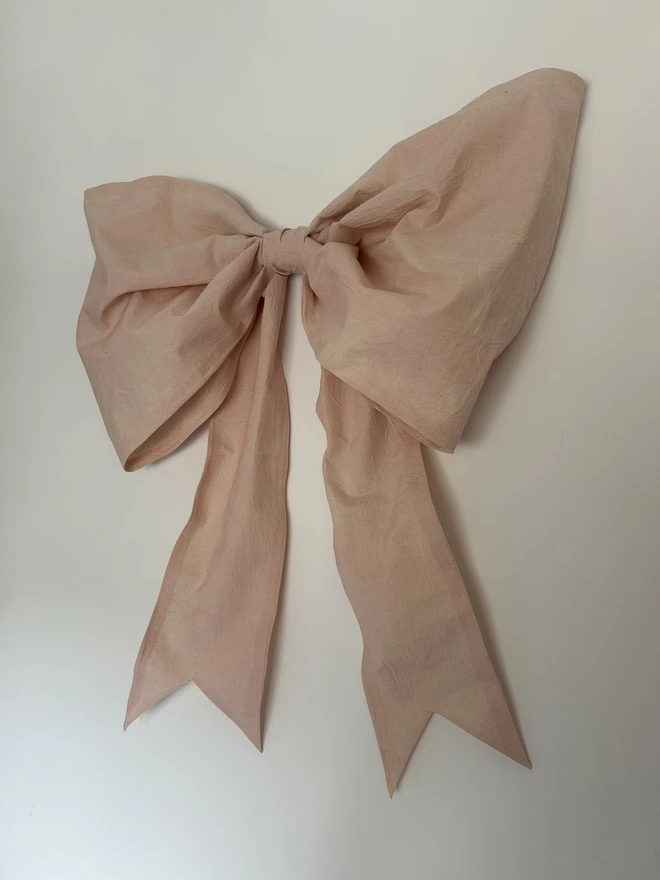 Pink bow wall decoration