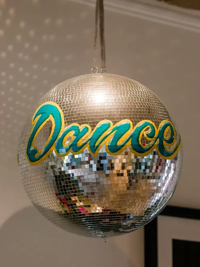 Dance sign painted disco ball