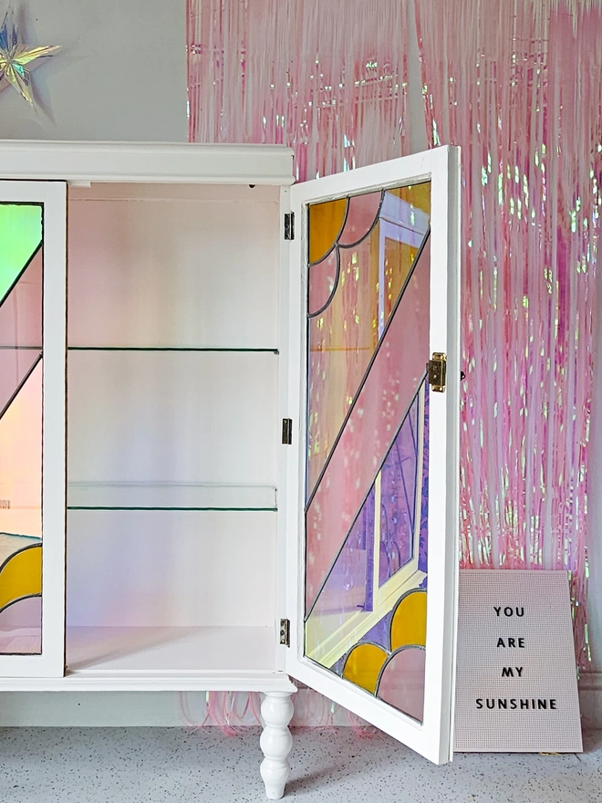 Create a pastel pink & irridescent Stained Glass Drinks Cabinet by Chloe Kempster