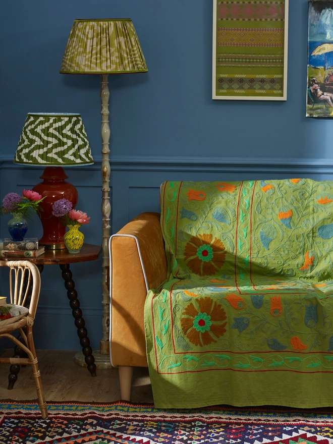 Pair of Green Ikat Lampshades in a Blue-Styled Sitting Room