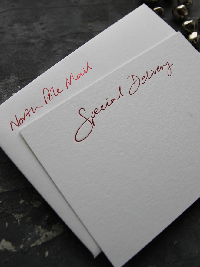 christmas notecard with Special Delivery in red foil comes with envelope which says North Pole Mail