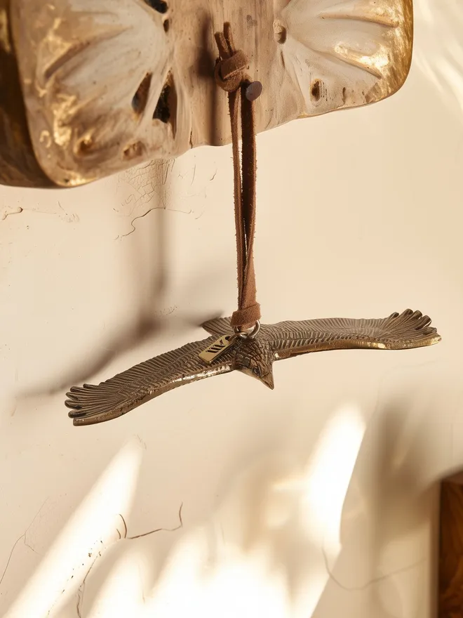 Buzzard hanging decoration with suede cord 