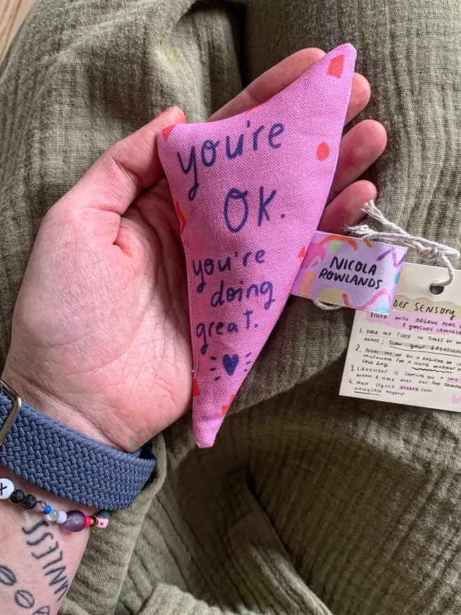 Purple sensory bag reads 'You're OK. You're doing great.'