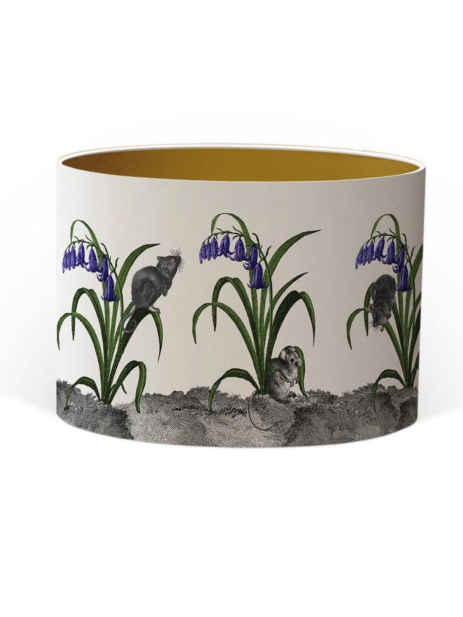 A whimsical lampshade featuring adorable mice hiding among bluebells, creating a charming woodland-inspired design.