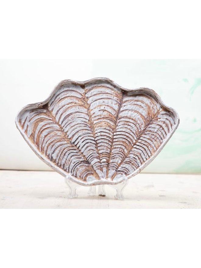 Ceramic shell plate