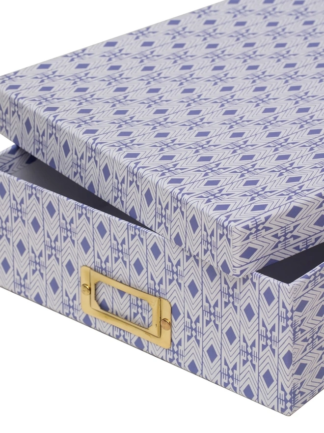 Tijan Lidded Portfolio Box, a colourful portfolio box sitting on a plain surface. 