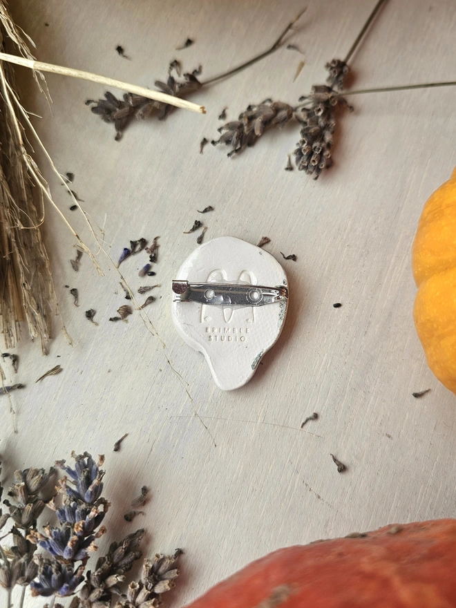 Skull bone ceramic halloween brooch
