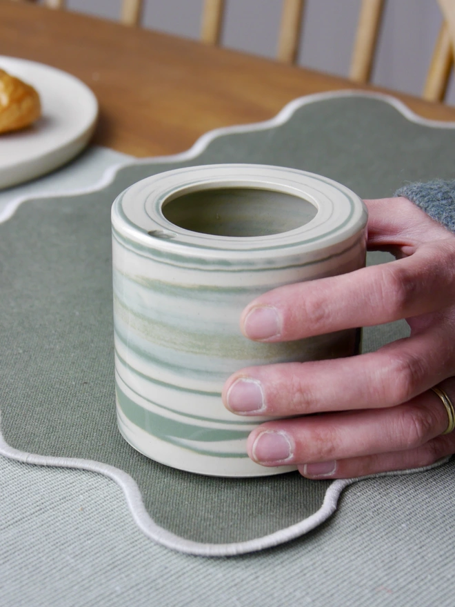 ceramic takeout coffee cup