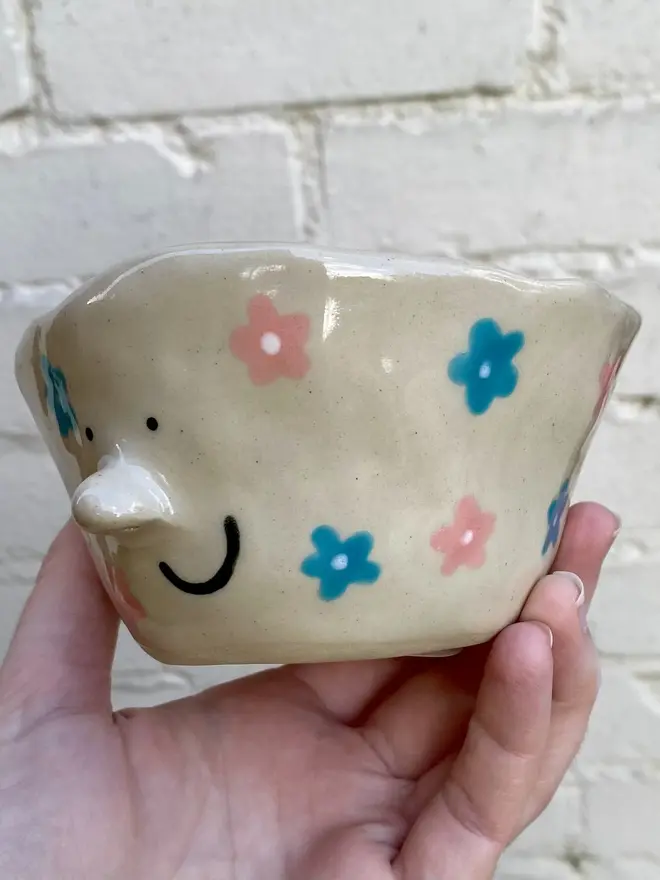 handmade ceramic smiley face floral pot