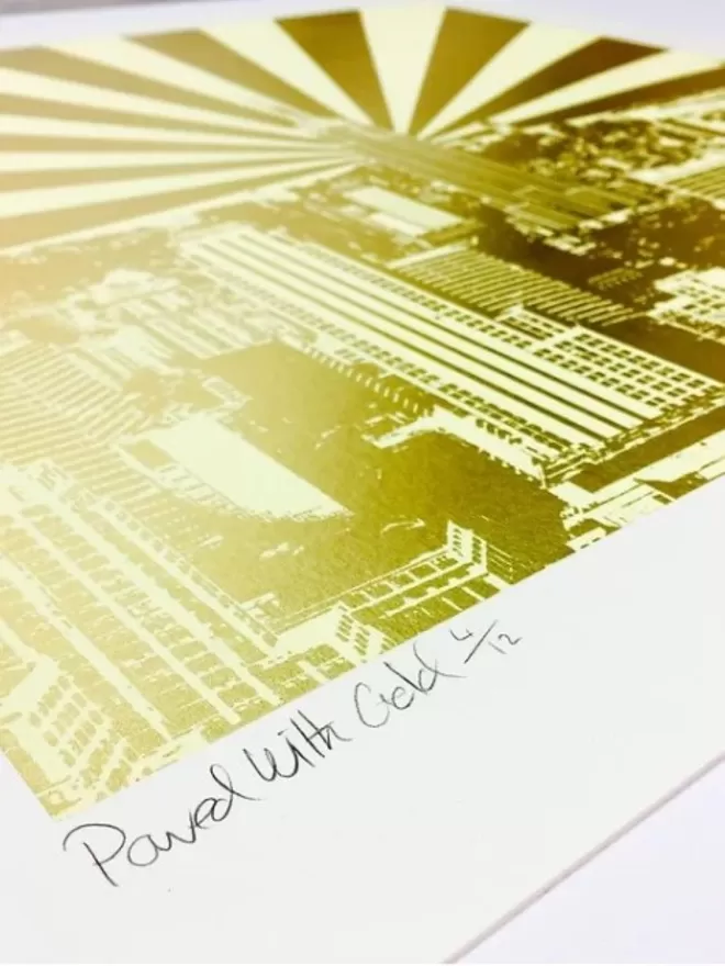 Close up of New York with gold leaf and gold rays signed with pencil 