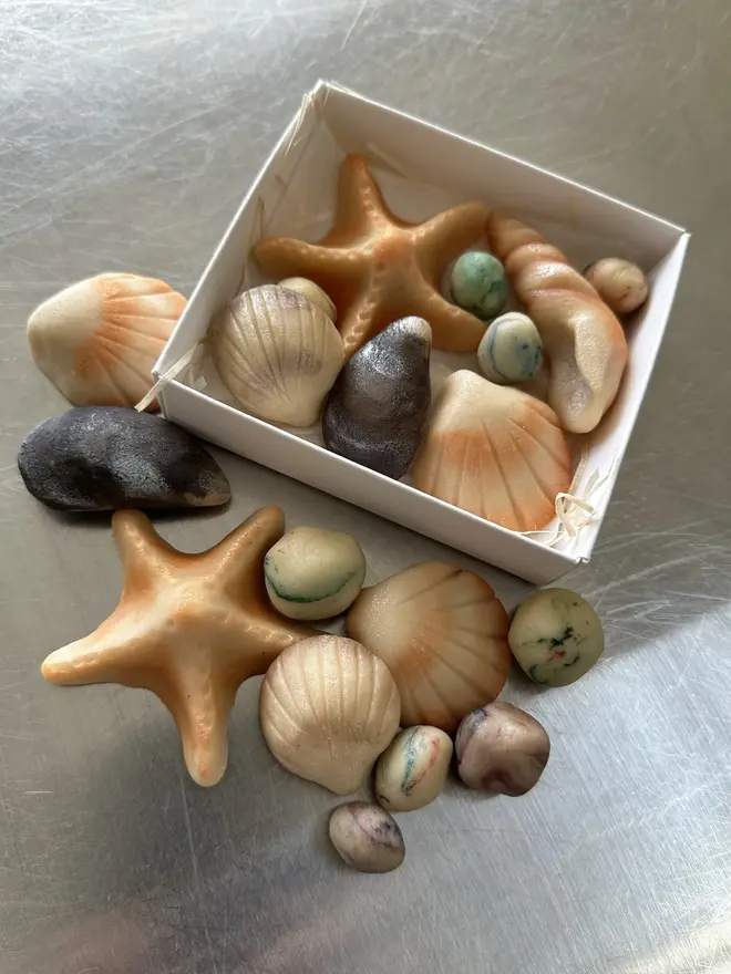 rock pool marzipan gift box. a selection of starfish, shell and pebble marzipan shapes.