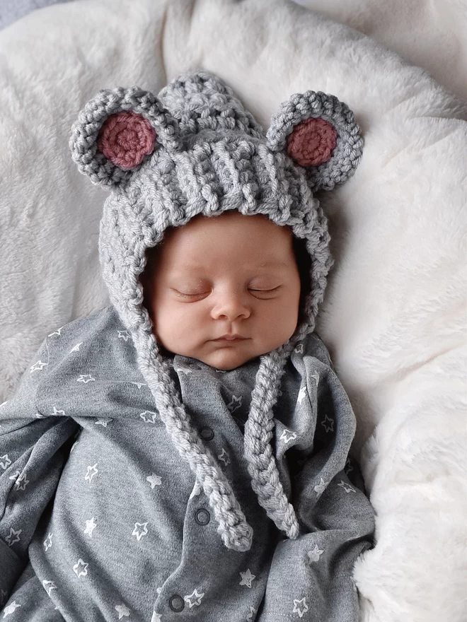 Baby wearing mouse hat