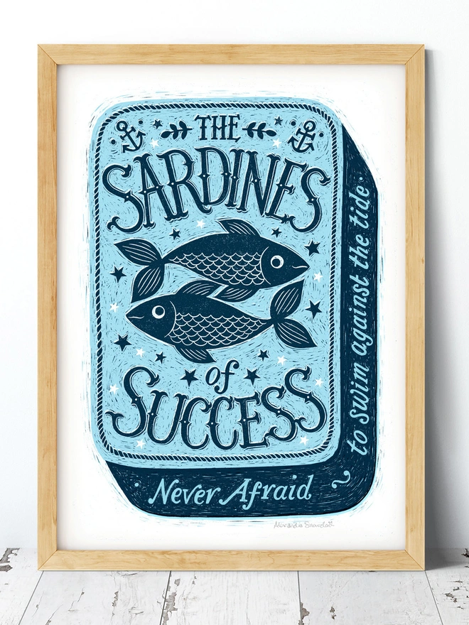 blue sardine tin print in wood frame