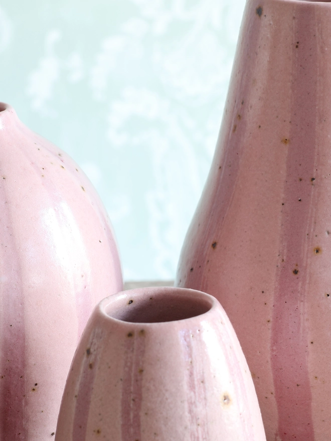 Close-up photograph of our Handmade Ceramic Stoneware Vases in Pink Stripe in three sizes: small, medium and large 