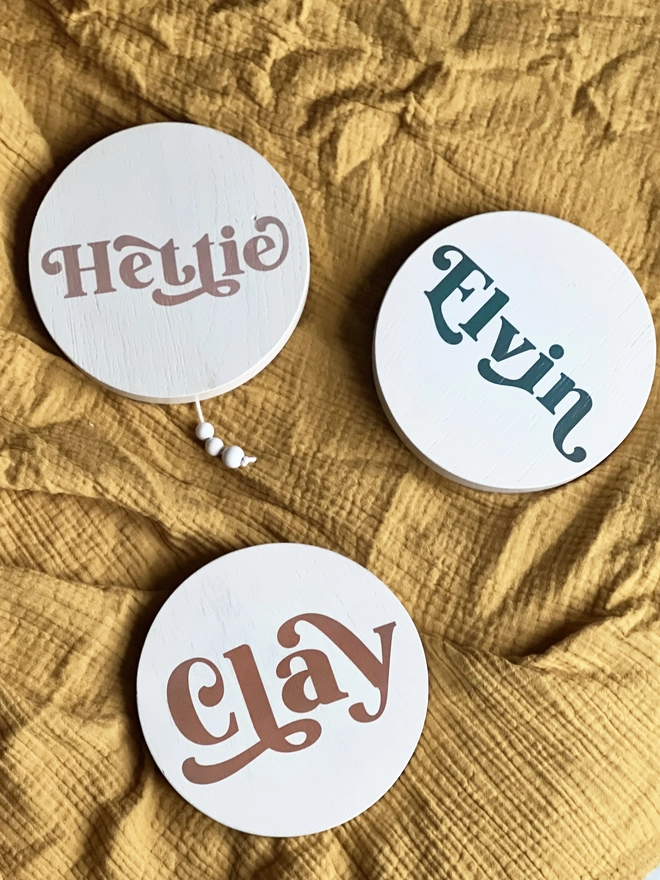 musical wall hangings with names printed on