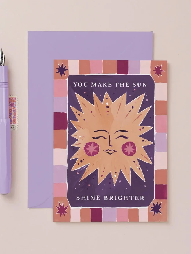 Sun Shine Brighter Card with a lilac envelope, smiling sun card reading You make the sun shine brighter