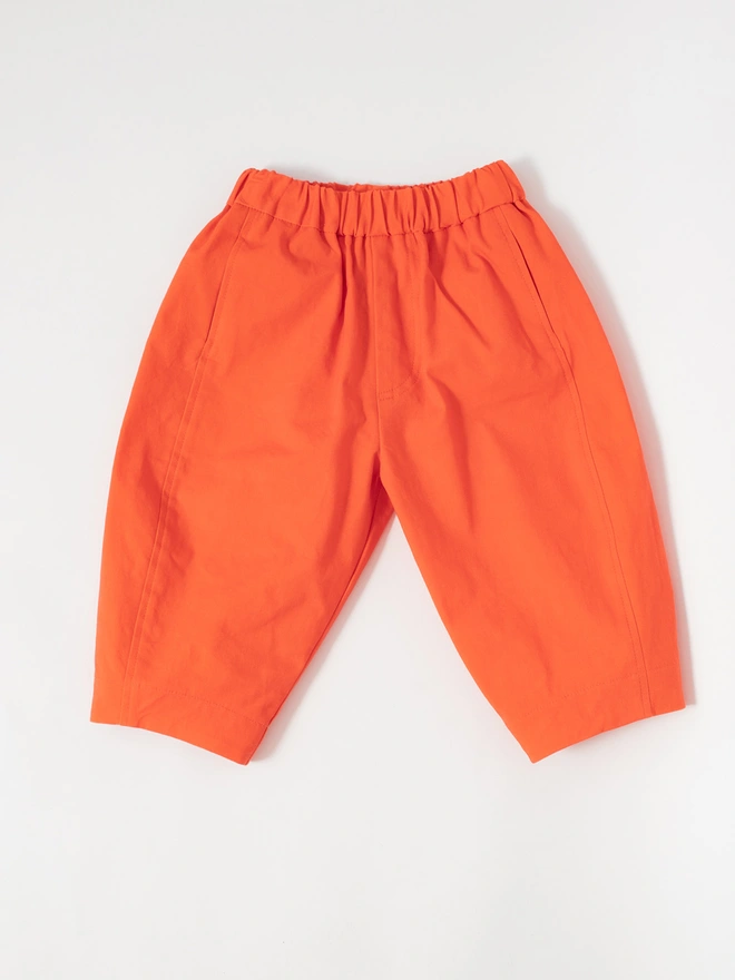 bright orange balloon shaped trousers by studio koter ando