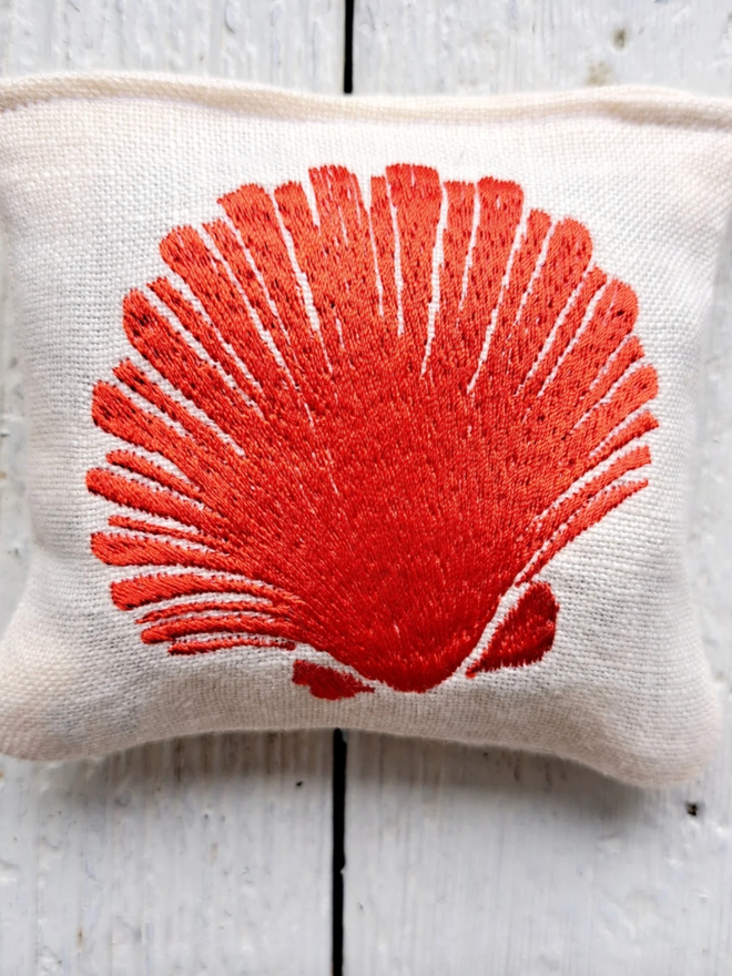 Sea Shell Lavender Sachet. A sachet in red.