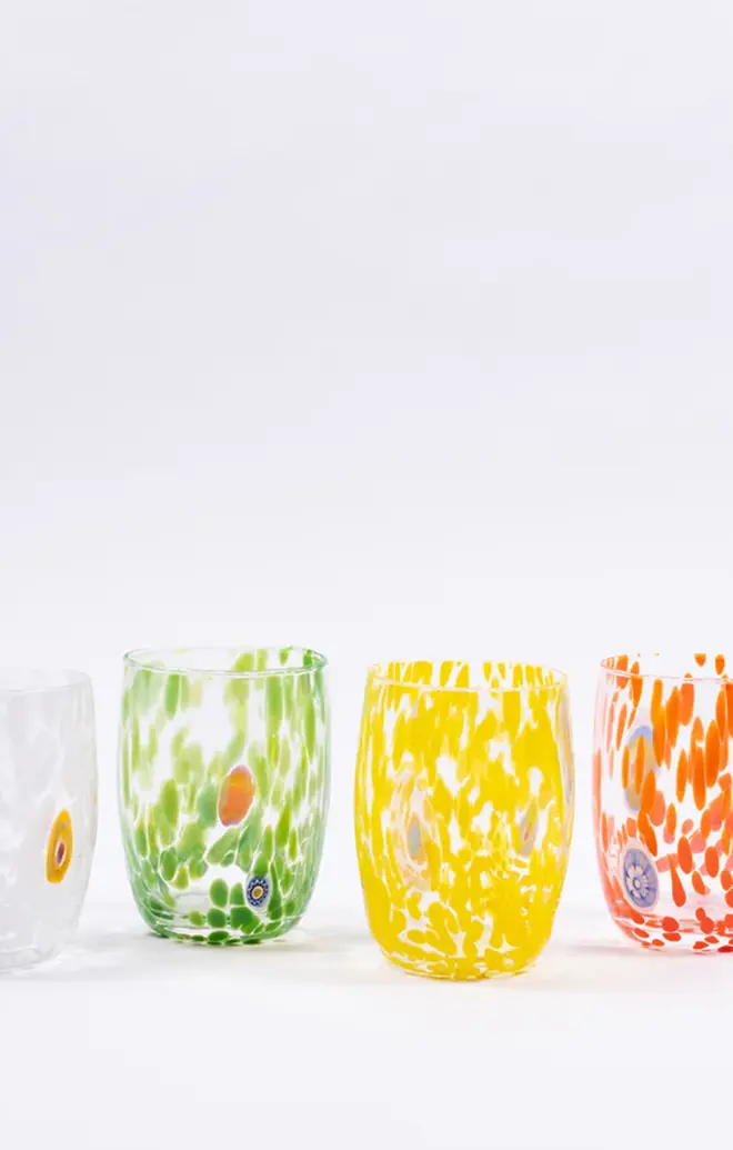 4 round tumbler glasses in white, green, yellow, and orange