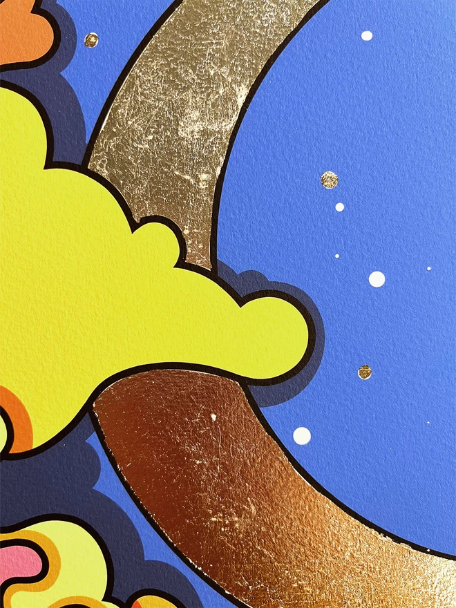 A close up of the silver leafing detail on the moon, and a yellow abstract cloud that sits across it.