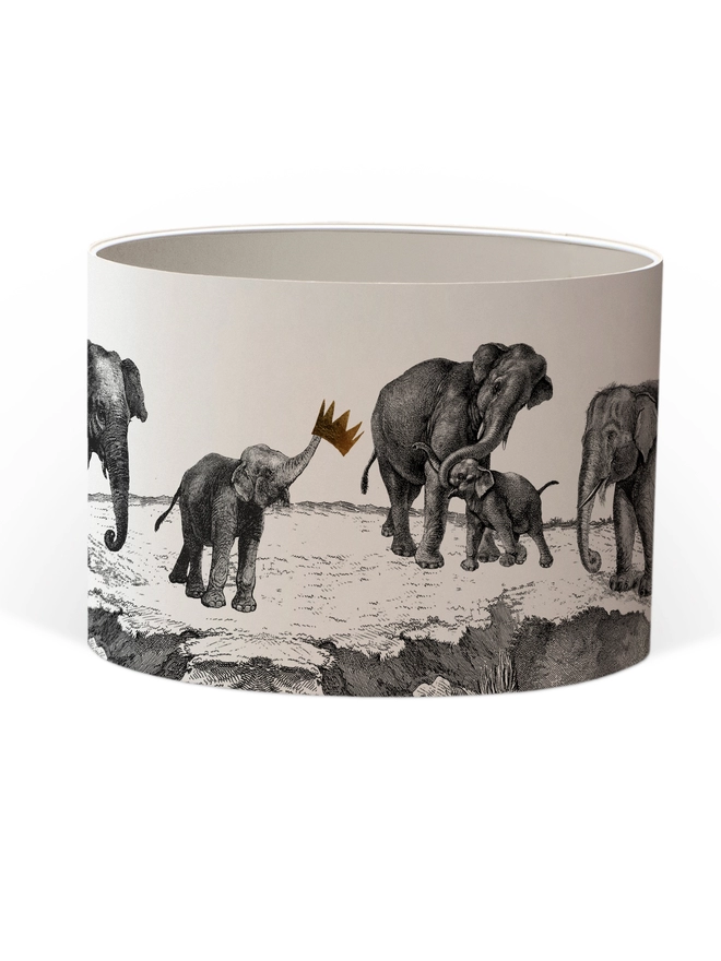 Drum Lampshade featuring elephants with a white inner on a white background