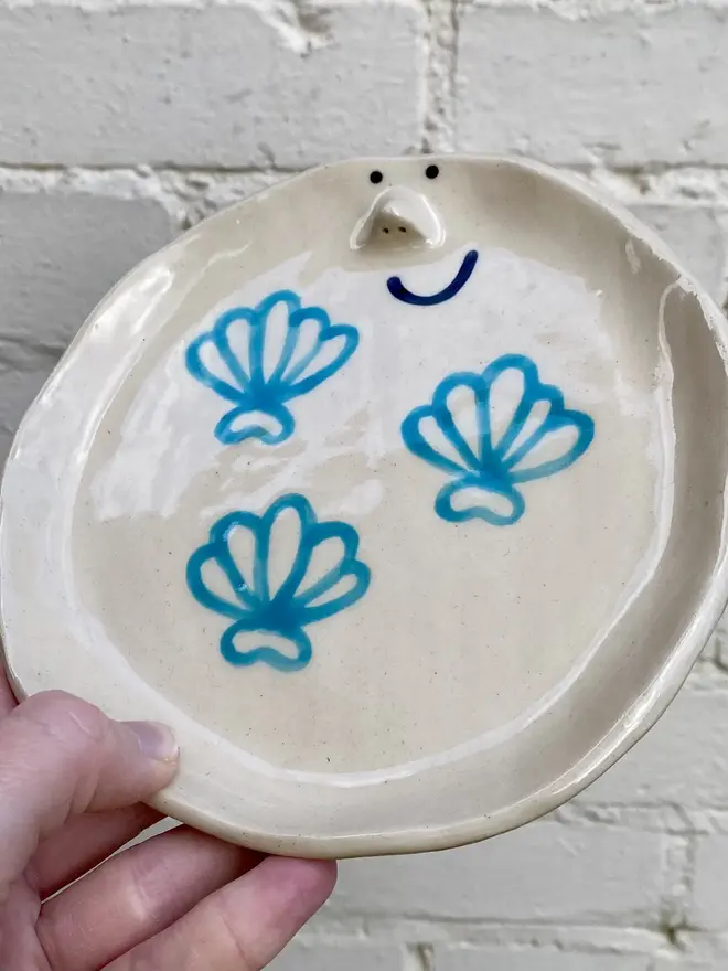 handmade ceramic shell smiley face plate