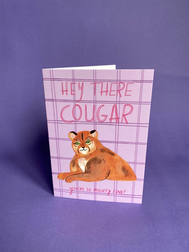 Pink gingham inspired greeting card with illustrated cougar that reads - Hey there Cougar, you're so mighty fine!