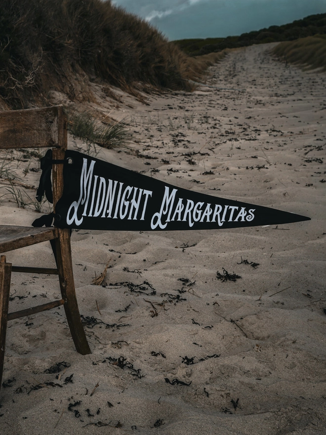 Black flag with white writting Midnight Margaritas