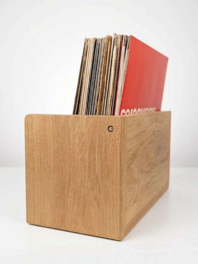 Rear view of the Compound LP Browser Slim showing the full-height solid oak back panel with engraved Compound logo