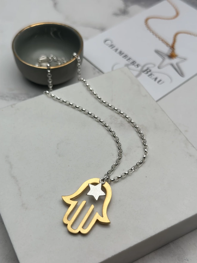 gold hamsa hand charm and sterling silver mini star with sterling silver chain