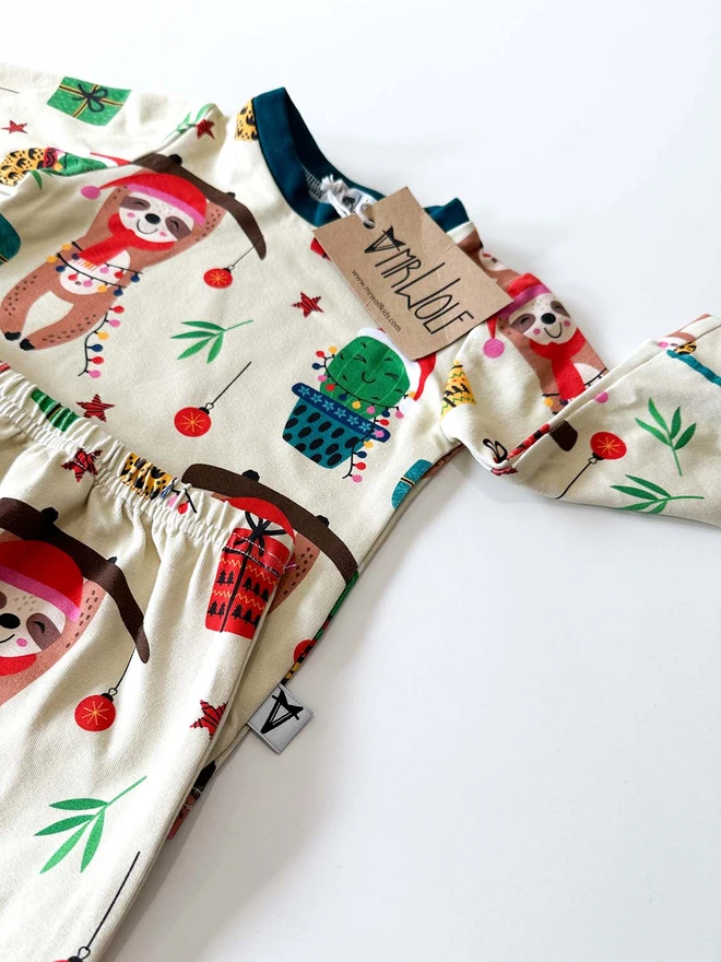 Baby and toddler lounge set with a cute festive sloth print