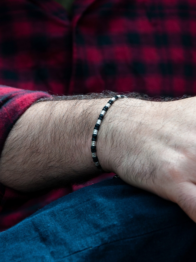 men rope and silver bracelet