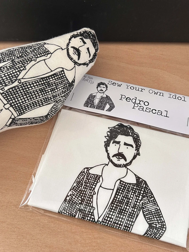 Sew Your own Idol cushion doll kit featuring a black and white illustration of Pedro Pascal.