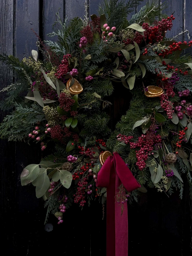 Handmade fresh Christmas berry wreath