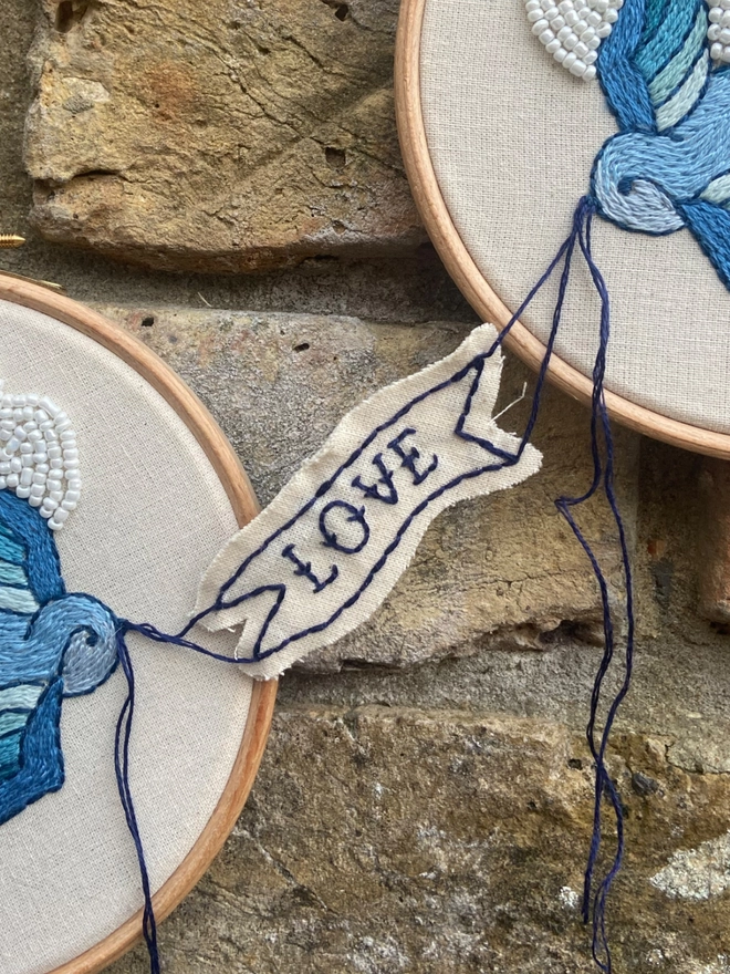 Embroidered love banner