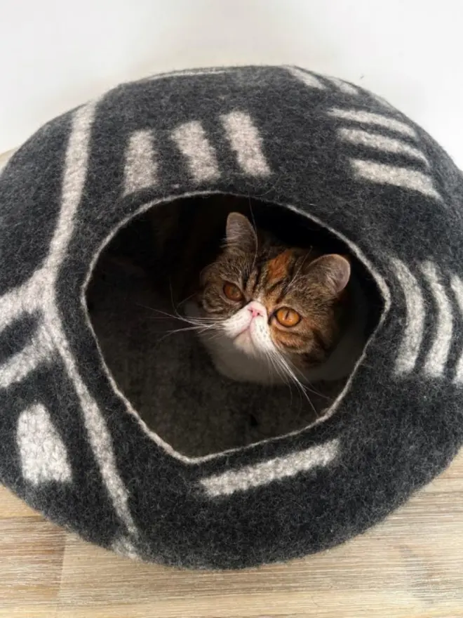 Black and white felt cat cave bed